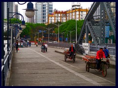 These old fashion bikes are still common in today's ulramodern China, especially for small companies to  carry goods.